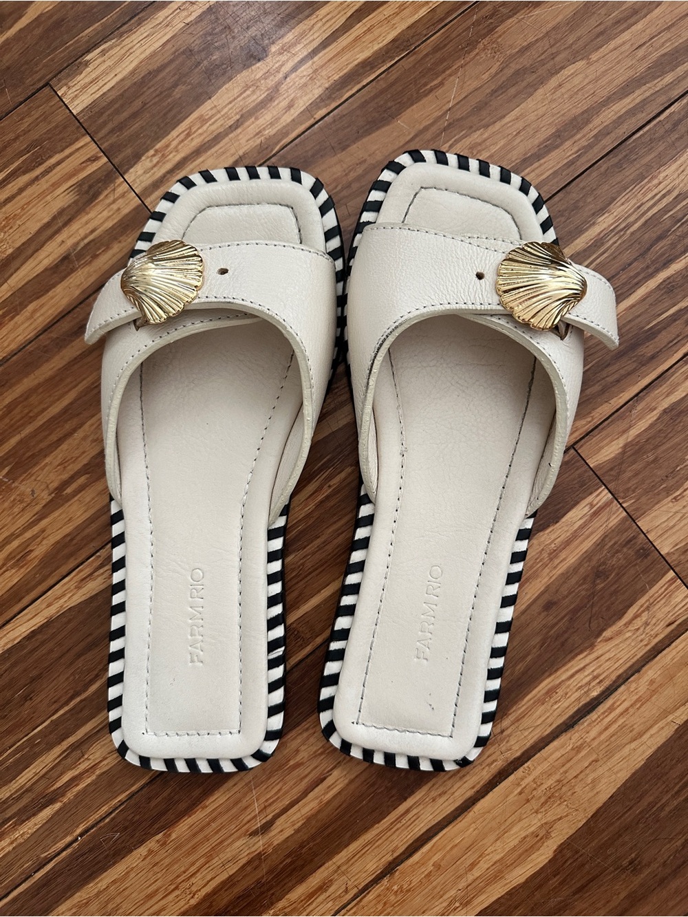 FARM Rio Cream Leather Slides with Gold Shell Accent